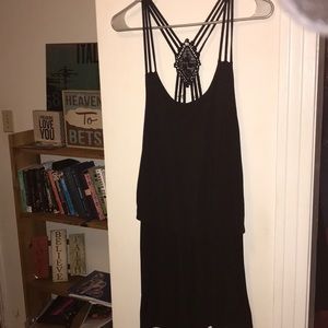 Black romper (L) but fits like a (M)